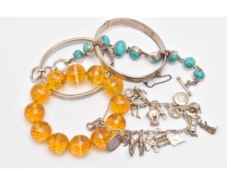 A SELECTION Of JEWELLERY, to include a silver hinged bangle with foliate pattern, fitted with a push piece clasp and addition