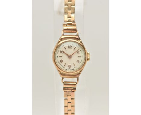 A LADIES 9CT GOLD WRISTWATCH, manual wind watch, round silvered dial with alternating Arabic numerals and baton markers, with