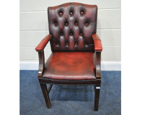 A RED LEATHER BUTTON BACK GAINSBOROUGH CHAIR, with open armrests, width 55cm x depth 65cm x height 93cm, condition report: id
