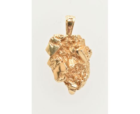 A YELLOW METAL ROUGH PENDANT, gold nugget shaped pendant fitted with a tapered bail, stamped 14k, length 40mm, approximate gr