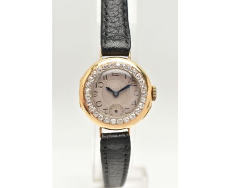 A LADIES 18CT GOLD DIAMOND WRISTWATCH, manual wind, round silvered dial, blue steel hands, subsidiary dial at the six o'clock
