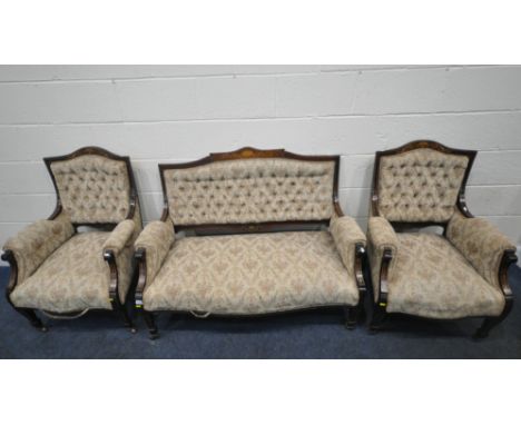 AN EDWARDIAN MAHOGANY THREE PIECE PARLOUR SUITE, with marquetry inlay, beige floral upholstery, button back rest, raised on f