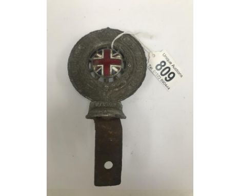 A Royal Automobile Club association car badge/mascot.