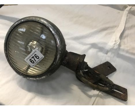 A Vauxhall driving light with unusual Lucas style Vauxhall England medallion.
