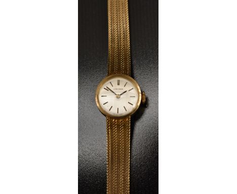 Longines - a retro 1970s lady's 9ct gold bracelet watch, silvered dial, block batons,17 jewel 5602 manual movement, serial No