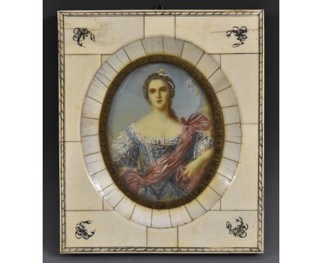A late 19th century portrait miniature of an elegant young lady 