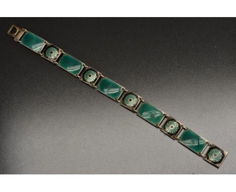 A mid 20th century silver and enamel bracelet, Starburst design by David Andersen, Norway, emerald green and black panels 