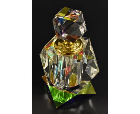 A large Art Deco style faceted perfume bottle, clear glass, peacock colour base, stopper (a/f) with dip stick, fitted box, ap