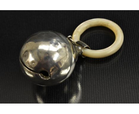 A silver and mother of pearl baby's bell rattle teether, hammered finish, Haseler &amp; Bill, Chester 1921