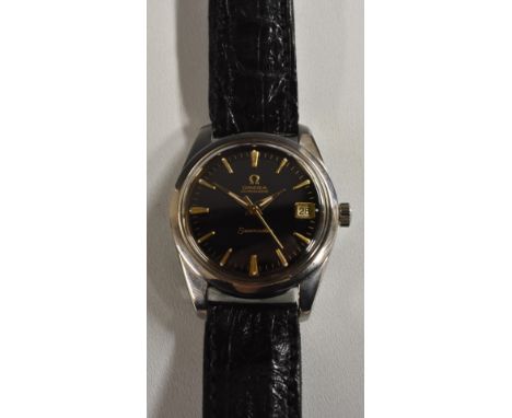 Omega - a vintage 1960's Seamaster Automatic wristwatch, gloss black dial, gilt Arrow baton markers, minute track, centre sec