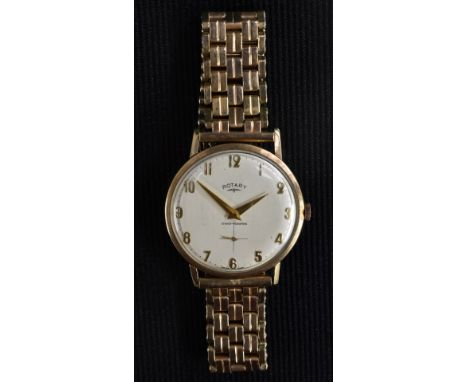 Rotary - a vintage retro 1960s 9ct gold cased gentleman's watch. textured dial, Arabic numerals, minute track, cross hair sec