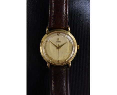 Omega - a vintage 1950s automatic 18ct gold cased wristwatch, two tone textured silvered dial, quartered Arabic numerals and 