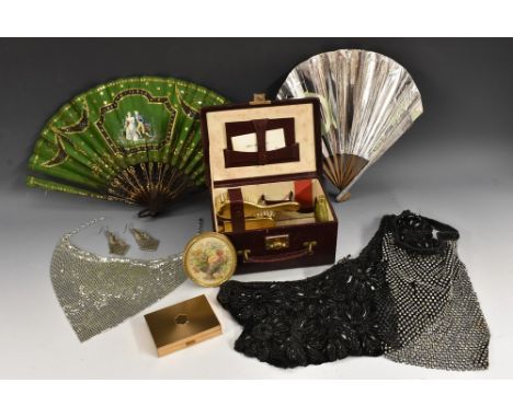 Ladies' accessories - a  travelling vanity case, burgundy leather; a Carene musical compact, Swiss movement, sifter, puff and