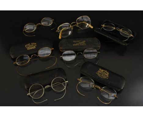 Spectacles - a pair of vintage 12ct gold plated and gilt metal framed oval spectacles, nose arch stamped 12ct Dy 1/10, sprung
