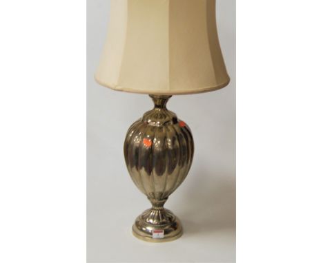 A modern chromed table lamp of melon form to circular footrim, with silk shade, height 66cm (including shade)