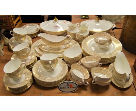 A Royal Doulton bone china eight place setting dinner and tea service, in the Sovereign pattern, H4973.Light signs of use thr