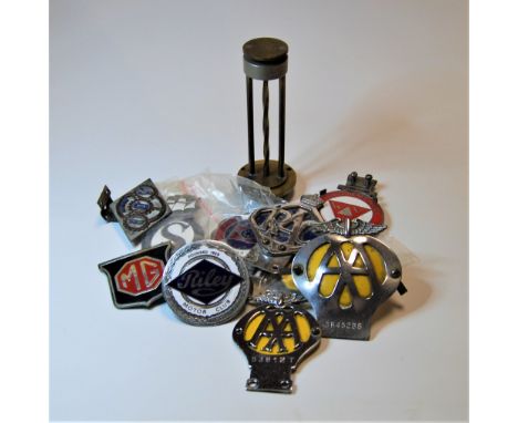 A collection of assorted chromed and enamelled car badges, to include Forde Dover, AA, Institute of Advanced Motorists, RAC, 