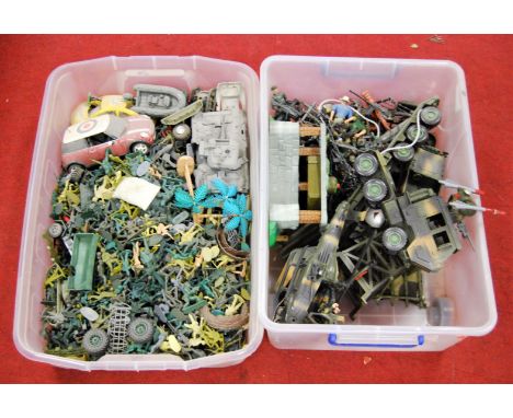 A collection of modern plastic army men and vehicles