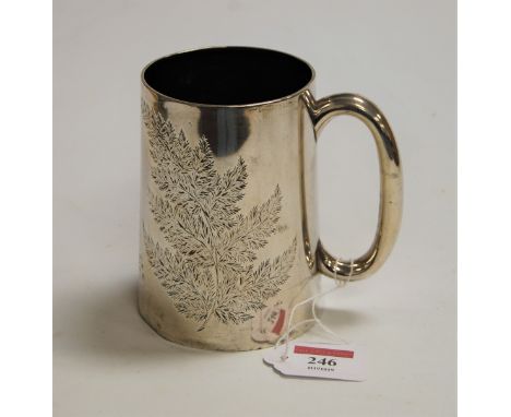 A late Victorian silver tankard, of tapered cylindrical form, engraved with fern leaves and flowers, h.12cm, weight 9.2oz.Som