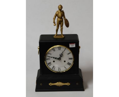 A modern black painted mantel clock, having a circular enamelled dial with Arabic numerals, eight day movement, the whole sur