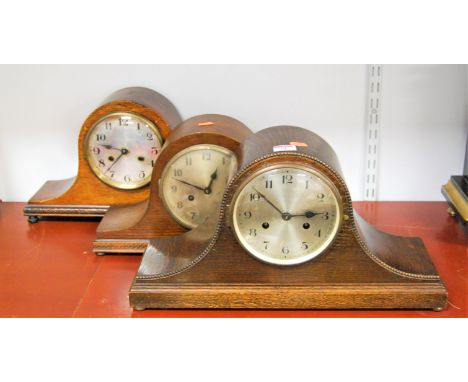A 1930s oak cased mantel clock having a silvered dial with Arabic numerals and 8-day movement striking on a gong, together wi