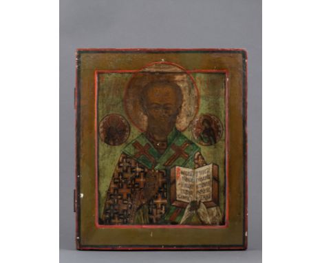 Saint Nicholas painted to the center with a large halo holding a scripture in his left hand, his robe and sash decorated with