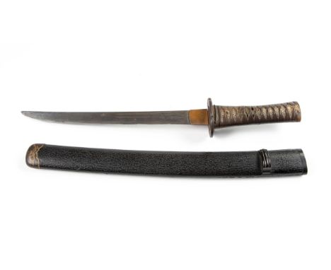 The curved blade housed in a textured black lacquer scabbard, saya, the hilt, tsuka, covered in ray-skin with lozenge-shaped 