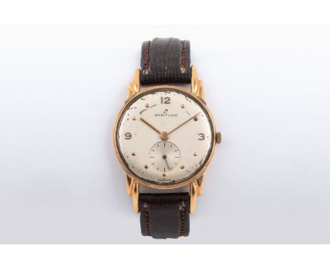 Reference number 179, manual, the circular champagne-coloured dial with gilt Arabic numerals and dot hour markers, subsidiary