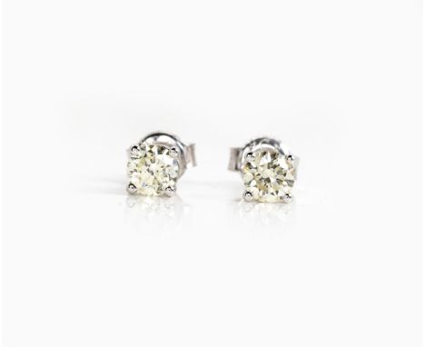 Each claw set with a round brilliant-cut diamond weighing approximately 0.48cts in total, approximate colour K/L and clarity 