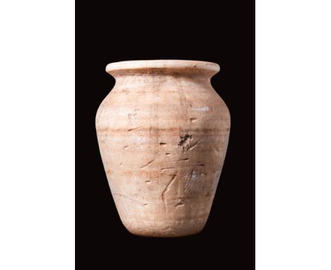 Late Period, Ca. 664 - 332 BC.
A finely carved alabaster offering vessel. The stone is near-translucent with banded inclusion