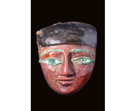 Late Period, Ca. 664 - 332 BC.
A large, finely carved wooden sarcophagus mask. It is carved from cedar and covered with gesso