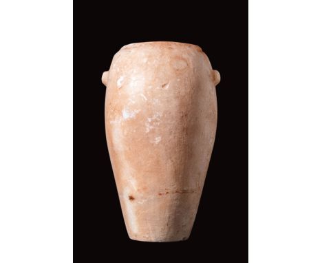 Old Kingdom, Ca. 2640 - 2150 BC.
An alabaster alabastron carved with a piriform body connected to a short cylindrical neck. T