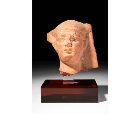 Ptolemaic Period, Ca. 332 - 30 BC.
A terracotta head of a Pharaoh from the Ptolemaic dynasty, characterised by elegant facial