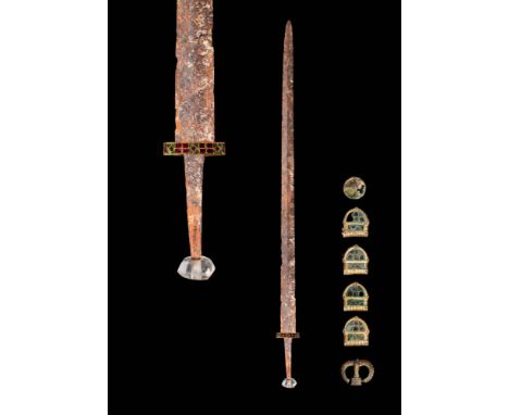 Ca. AD 600 - 1200.A collection featuring a late Anglo-Saxon/Viking sword with golden guard inlaid with cloisonné and rock cry