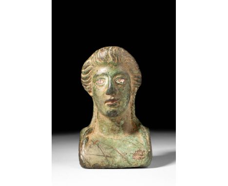 Ca. AD 200 - 300.
A cast-bronze herm of Venus cast via the lost wax (cire perdue) process. Her elegant countenance is compose