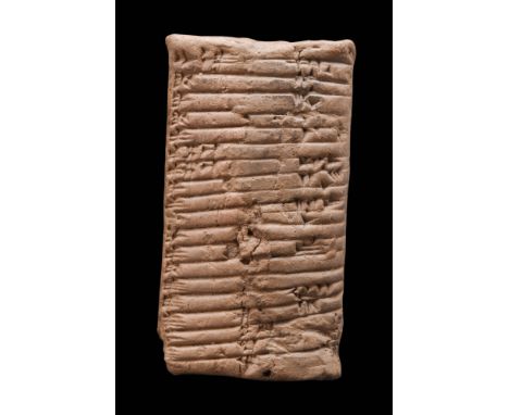 Ca. 2500 - 1800 BC.
A small clay tablet of a rectangular form, with planar peripheries and slightly convex forms. The tablet 