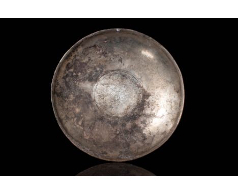 Ca. AD 400 - 600.
A round silver vessel with a deep basin. In tondo is the largest motif, a depiction of a king on a horse hu