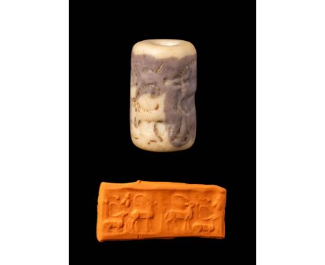 Ca. 600 - 400 BC.
A cylinder seal made out of purple and cream stone. It depicts a frieze of standing and recumbent stags wit