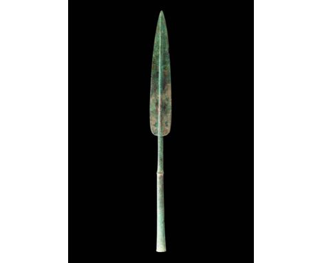 Ca. 900 - 800 BC.
A bronze spearhead made using the lost-wax casting process. This well-balanced weapon has a slender, cylind