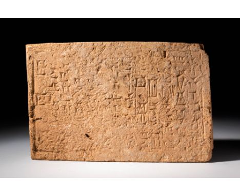 Ca. 1200 - 800 BC.A ritual brick with a rectangular section featuring fourteen columns of cuneiform text mentioning the found