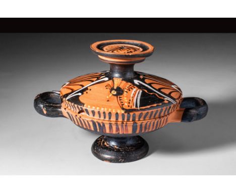 Ca. 350 - 300 BC.
A fine wheel-thrown lekanis with a shallow basin, pedestal foot, and lid beautifully decorated via the red-