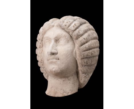 Ca. AD 190 - 217.
A marble head of the Empress Julia Domna, wife of the Emperor Septimius Severus, depicted with well-defined