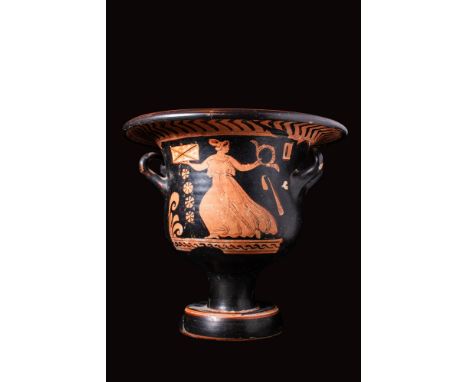 Ca. 350 - 320 BC.
A red-figure pottery bell krater with a large body, short splayed foot, a flanged mouth and two well-preser