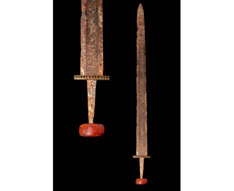 Ca. AD 600 - 900.
A late Anglo-Saxon / Viking sword features a long blade with two sharpened edges, a pronounced central ridg