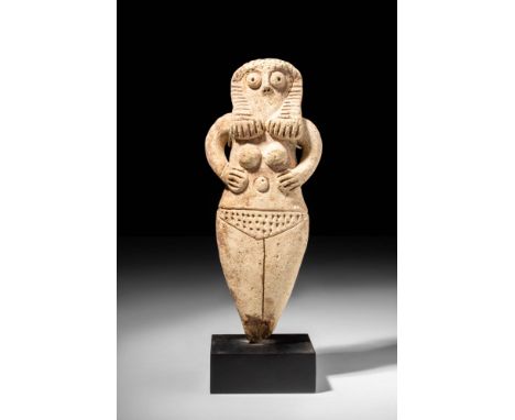 Ca. 2000 - 1500 BC.
A pottery idol of characteristically abstract form depicting a female deity - likely Astarte, the goddess