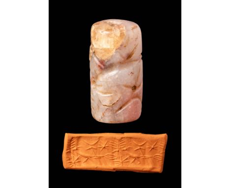 Ca. 3100 - 2900 BC.
A cylinder seal made of translucent stone. It depicts a frieze of mythological running animals made in a 