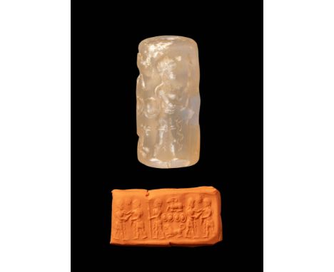 Ca. AD 200 - 400 .
A cylinder seal made of rock crystal. It depicts a fighting scene between soldiers using knives and spears