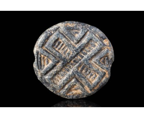 Ca. 3000 - 2000 BC.
A North Mesopotamian or central Asian, black stone stamp seal, a hemi-spheroid pierced horizontally. Desi