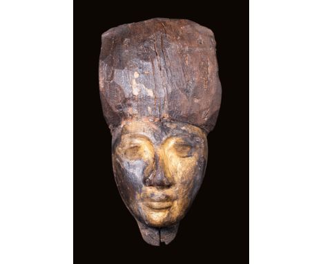 26th Dynasty, Ca. 664 - 525 BC.
A wooden sarcophagus mask. It is carved from cedar and covered with gilt gesso. The idealised