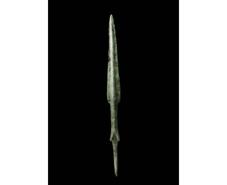 Ca. 1200 - 800 BC.
A bronze spearhead made using the lost-wax casting process. This well-balanced weapon has a slender, but s